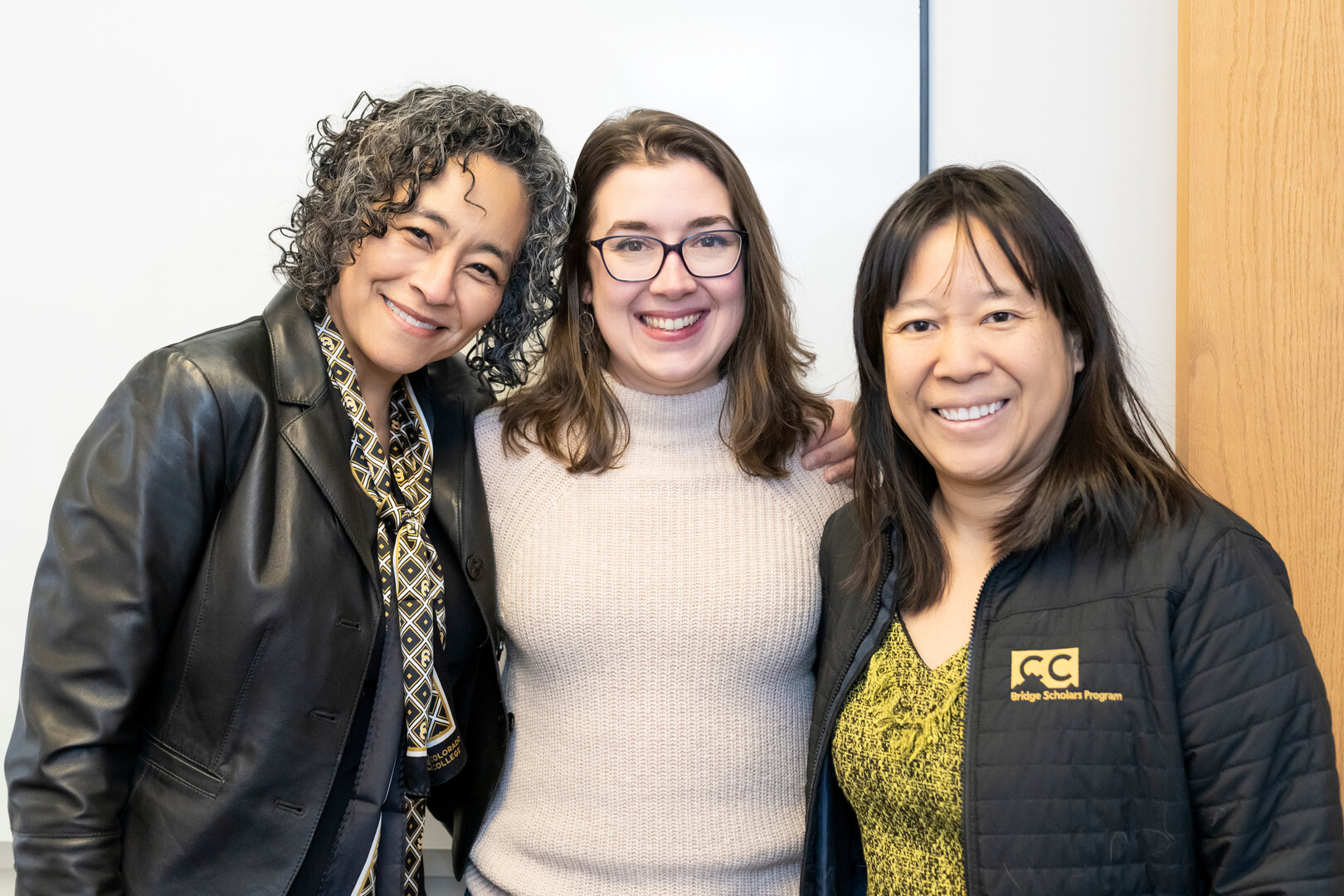 Natalie Gosnell, Assistant Professor of Physics, center. President L. Song Richardson (L) and Dean of Faculty Emily Chan (R).